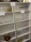 Two White pressboard shelf units only (items not included)