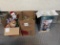 Two boxes of Christmas decorations and one large glass Santa in box