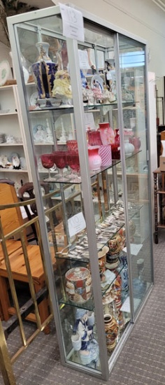 Display case of clear glass with five shelves (items not included)