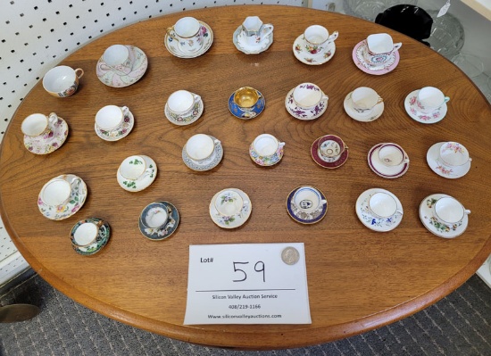 26 small tea cups and saucers