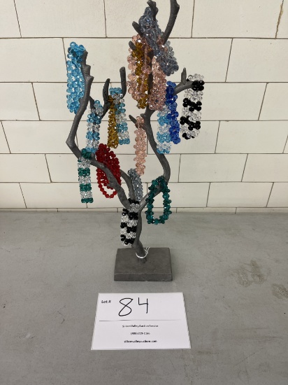 Pewter metal tree w/branches and approximately 18 crystal bracelets