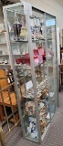 Display case of clear glass with five shelves (items not included)