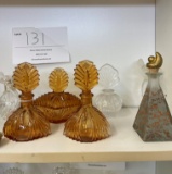 Ten glass and crystal perfume bottles