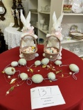 Easter bunnies with eggs and egg garland