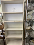 White pressboard shelf unit only (items not included)