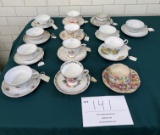Thirteen cups and saucers
