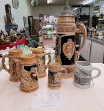 Six steins of various origins and sizes, ceramic