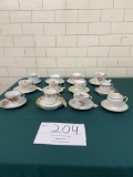 Twelve demitasse tea cups and saucers