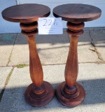 Pair of wood pedestals with a round top  36