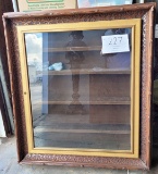 Wall cabinet - wood framed with gilt inside for collectibles