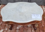 Antique wood end table on castors with marble top