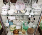 Three shelves of various crystal and china