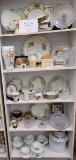 Contents of five shelves - glassware and china