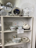 Contents of three shelves and top - glassware and china