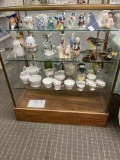 Various china pieces, figurines and more - all three shelves