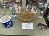 Four china figures, glass cruet, pink glass bowl and more
