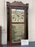 Antique wood clock with hand painted glass doors