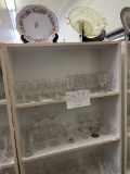 Contents of five shelves and top - glassware and china