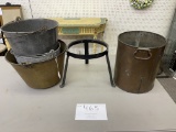 Three metal buckets, black metal stand, brown metal trash can