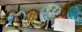 Bright colored ceramic pitchers and plates