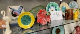 Bright colored ceramic plates, vases, dishes and collectibles
