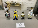 Four Murano glass clowns (two clowns are decanters)