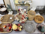 Eight various baskets (one made of sea shells, faux fruit