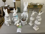 Five ceramic bunnies and lamb egg cup