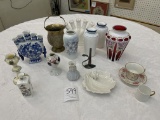 Various china pieces - salt and pepper, nine vases, bucket and more