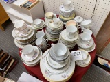Collection of china tea cups and saucers, some mismatched