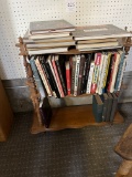 Two shelf dark wood bookcase with books