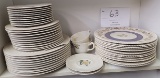 One shelf of Haviland china plates