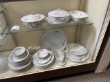Two shelves of china (no glassware included)