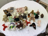 Box of small stuffed toys and one doll (approximately 25)