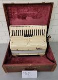 Accordian in case 