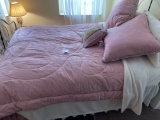 Pink comforter and three throw pillows  90