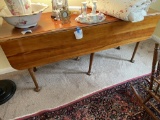 Wood table with drop leaf sides