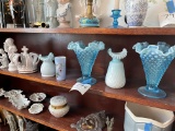Second from top shelf - five pieces blue glassware and more