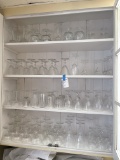 All glassware inside kitchen cabinet