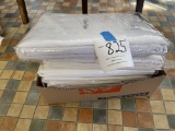 Five tablecloths, new in packages