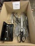 Various scissors, tweezers and dental picks