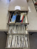 Various paint brushes and tweezers
