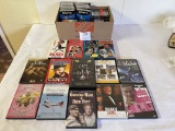 Misc DVDs and VHS tapes; box of blank tapes