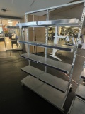 Metal shelving with five shelves on wheels