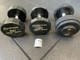 Two 24HR Fitness Iron Grip dumbbells and one IGX dumbbell