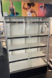 Tall display case with shelves