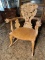 Ornate carved rocking chair
