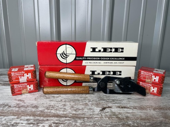 Two Lee Bullet Molds and Four Boxes of Lead Balls
