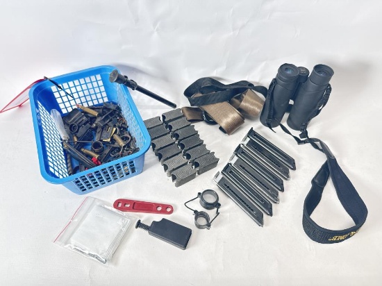 Misc. basket of .22 mags, binos and climbing strap