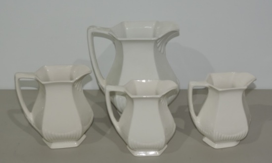 Lot Of 4 Graduated Ironstone Pitchers